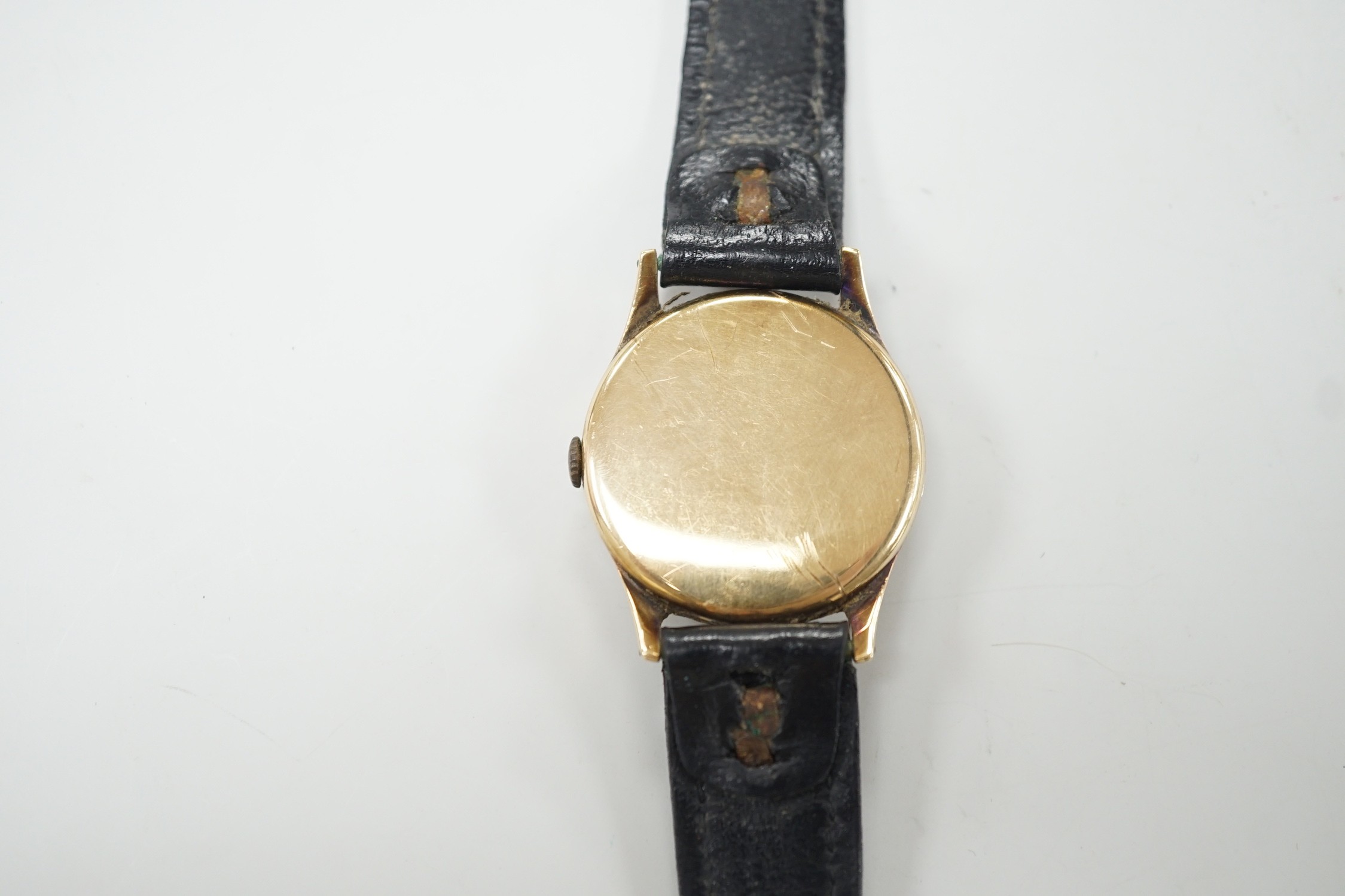 A gentleman's 1950's 9ct gold Omega manual wind wrist watch, movement c.265, case diameter 34mm, on later associated leather strap.